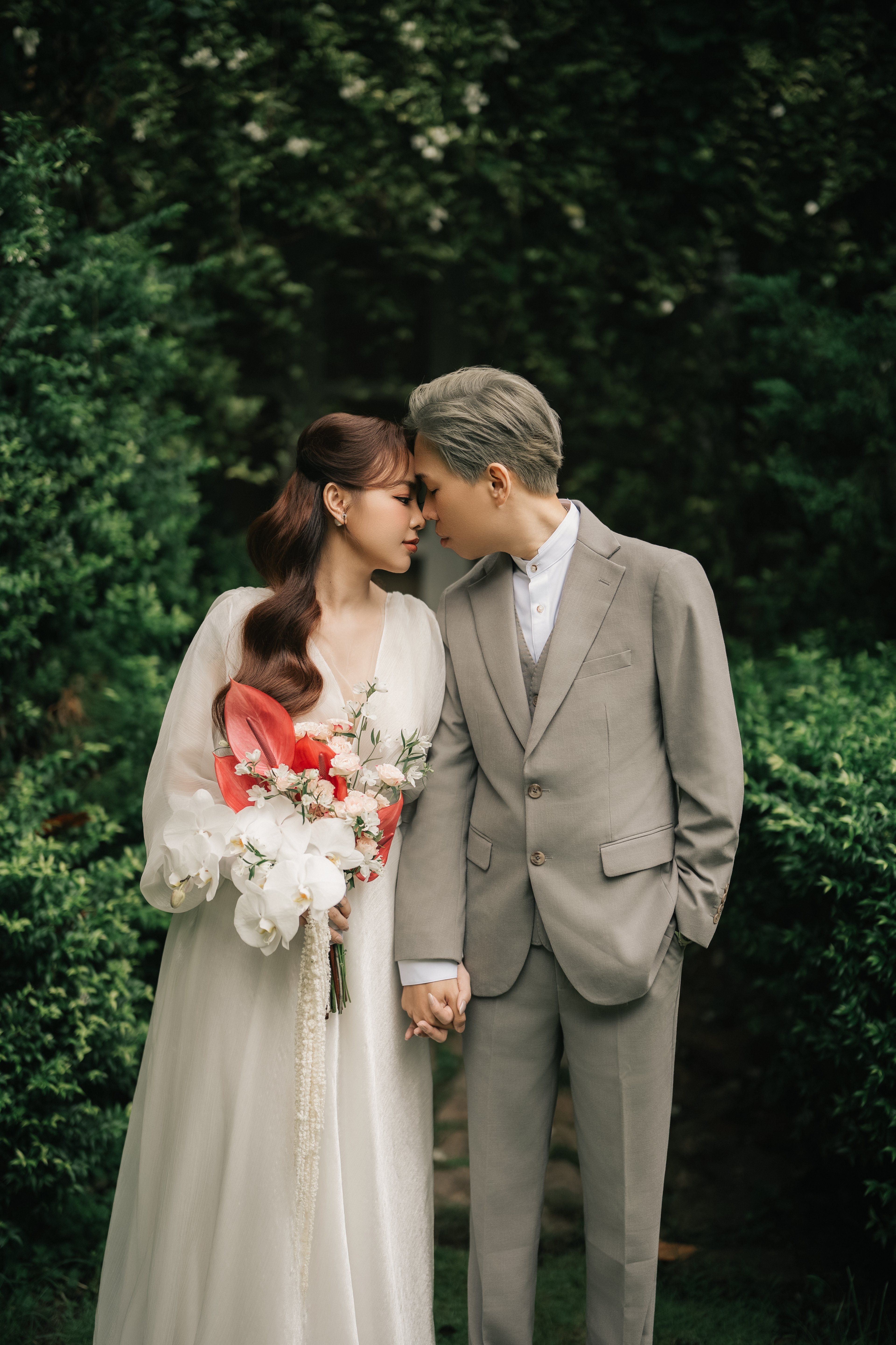 Bride and groom in a garden